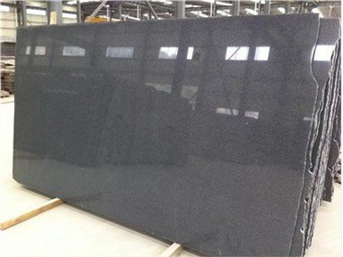 G654 Seesaminharmaa graniitti