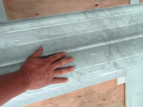 white carrara marble fireplace surround